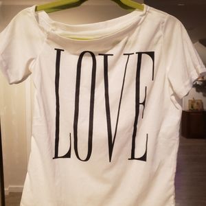 ❤White off one shoulder.  Love printed on the front.  Crop top.